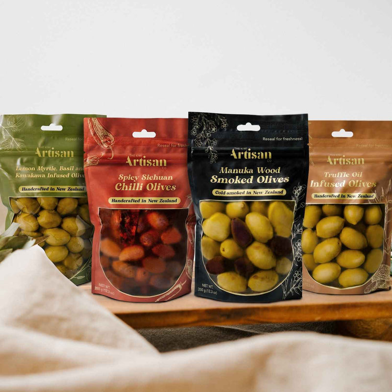 Infused Olive Range (Four Pack) – Manuka Smoked, Truffle Oil, Lemon Basil & Kawakawa, and Sichuan Chilli Olives