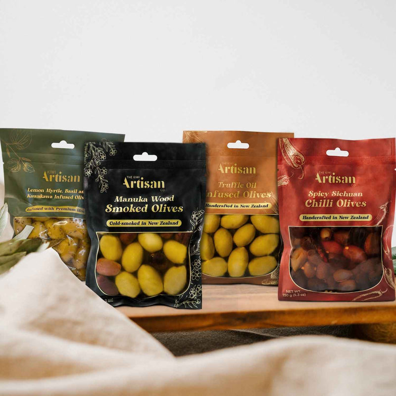 Infused Olive Range (Four Pack) – Manuka Smoked, Truffle Oil, Lemon Basil & Kawakawa, and Sichuan Chilli Olives